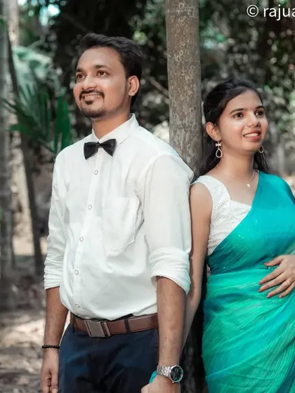 A quiet moment together in nature. This pre-wedding photo captures the couple looking towards the future, surrounded by the peaceful atmosphere of a forest near Panvel.