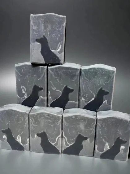 My Vanishing Phantom Hound soap, created for a "Ghost Swirl" challenge. The dog silhouette is set against a starry night sky, a design achieved by altering lye concentrations.