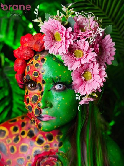 This shot captures the striking contrast between the two halves of the face, one representing lava and the other lush nature.