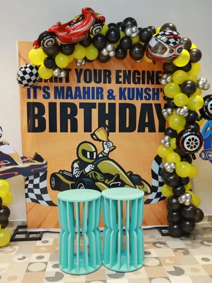 "Start your engine, it's Maahir & Kunsh's birthday!" This go-kart and racing-themed backdrop is perfect for a joint birthday party for two young speedsters.