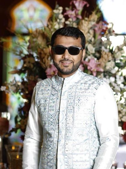 Another shot of Vineet looking dapper and ready for the celebration in his custom bundi set.