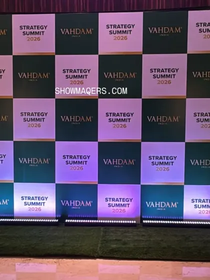 A branded media wall is essential for photo opportunities and social media engagement. We created this checkerboard-patterned backdrop for the Vahdam Summit, ensuring brand visibility in every photograph.