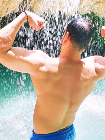 Fitness is a lifestyle you can take anywhere. Here I am enjoying a waterfall in Thailand, but still finding a moment to flex and celebrate a healthy body.