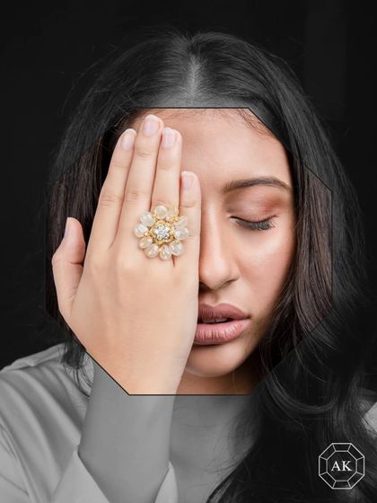 This casual cocktail ring is set with vibrant yellow sapphires, complemented by a mix of yellow and white diamonds.