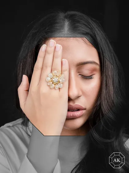 This casual cocktail ring is set with vibrant yellow sapphires, complemented by a mix of yellow and white diamonds.