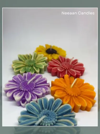 Gifting flowers can be awkward, but these floral candles are the perfect twist. This collection of colorful daisy candles is thoughtful, handmade, and they last forever.