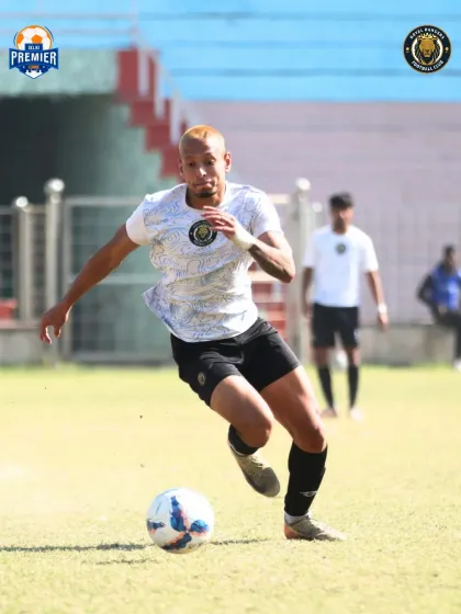 A player runs with the ball, driving the team forward with pace and determination.