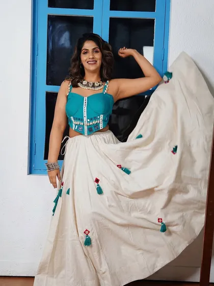 A full-length view of the second Navratri outfit. The makeup is versatile enough to pair beautifully with this indo-western look, making it perfect for any festive occasion.