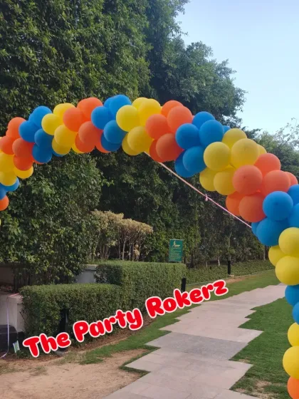 A simple yet effective balloon arch in Naruto's signature colors, perfect for an outdoor party entrance.