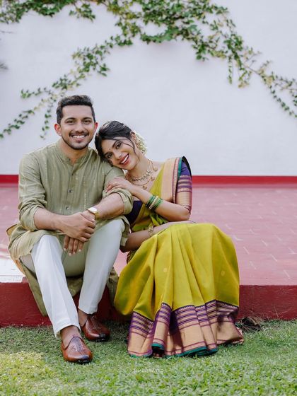 A journey of love, starting with the essence of tradition. A beautiful pre-wedding photo that captures the couple's chemistry.