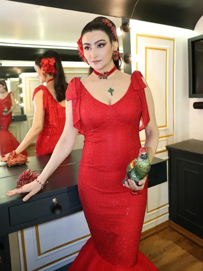 For this high-profile appearance on Big Boss, we went for pure drama and elegance. I styled this stunning, custom red mermaid gown that commands attention with its vibrant color and figure-hugging silhouette, ensuring my client was the undeniable center of attention.