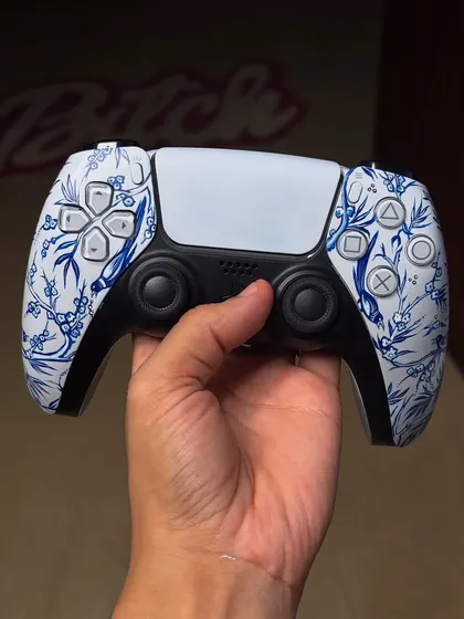 A close-up of the detailed linework on the custom PS5 controller.
