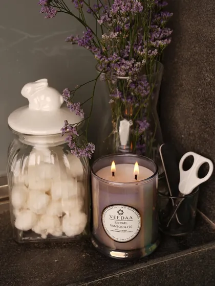 Our Bengal Bamboo & Fig candle adds a touch of picture-perfect elegance to any corner of your home. The iridescent glass jar catches the light beautifully, complementing its fresh, green fragrance.