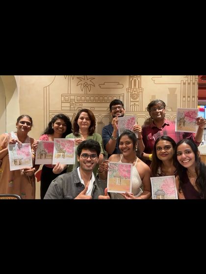 A happy group photo from a workshop where we used edible superfood powders to paint. Always fun to experiment!