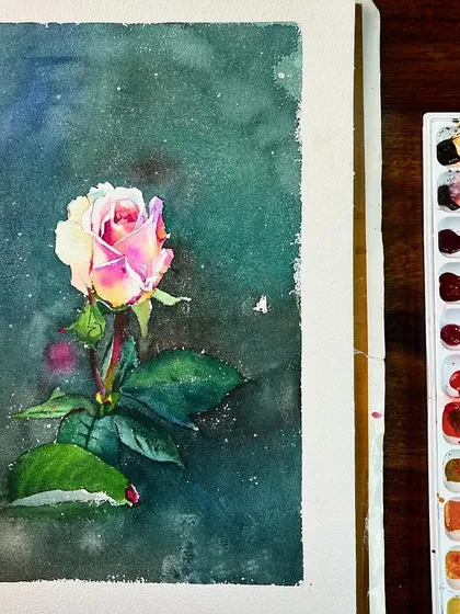 The rose demonstration on my desk, giving a clear view of the painting and the colors used.