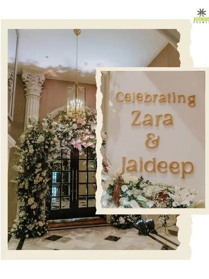 A grand floral entrance arch to welcome guests to the reception, setting a tone of elegance and celebration.