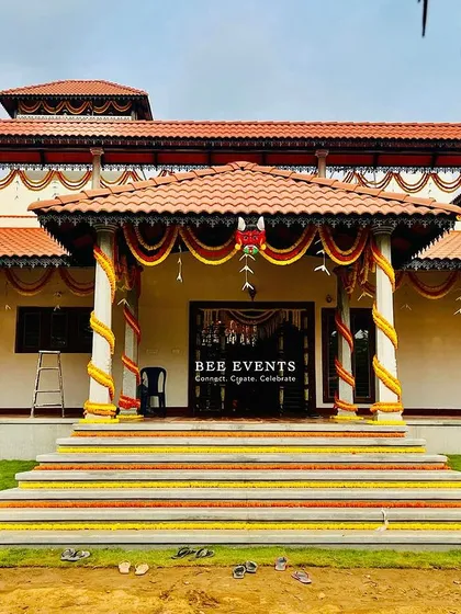 The same decorated farmhouse, seen from a slightly different angle. The consistency of the decor and the way it complements the house's design is evident.