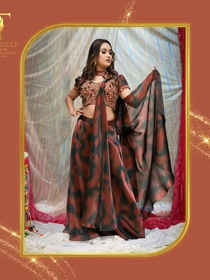 The movement and flow of this printed saree make it a joy to wear for any festive occasion.