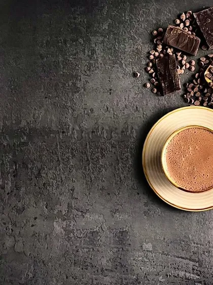 This is an example of my moody food photography style. Using a dark, textured background and directional light, I created a rich, comforting atmosphere for this hot chocolate shot, making you almost smell the cocoa.