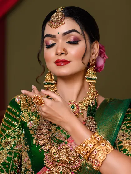 The same bridal look with eyes closed, showcasing the beautiful cut-crease eyeshadow technique.