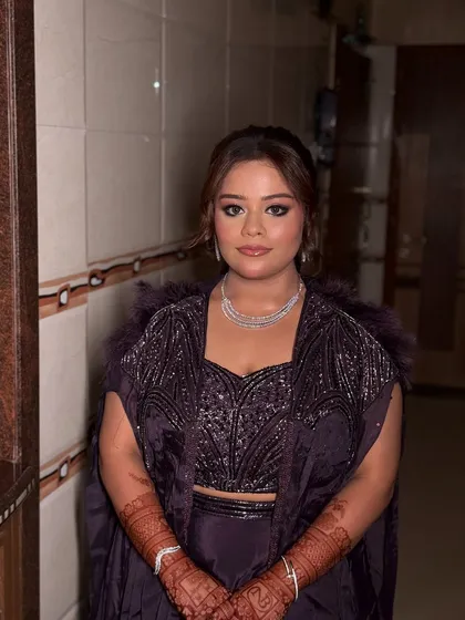 More shots of my sister Bhavisha looking absolutely radiant for her Roka. The purple outfit was complemented by a soft glam makeup look with shimmery eyes and a pretty pink lip.