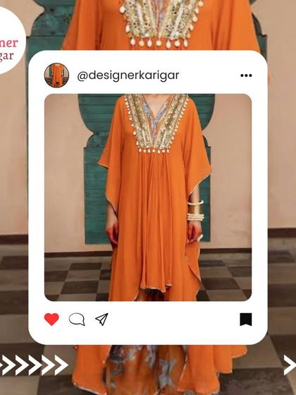 An orange high-low kaftan with a heavily embellished V-neck, perfect for a party or special event.