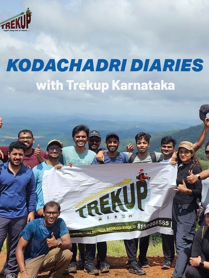 The Kodachadri Diaries: A happy group poses with the Trekup banner at the summit.