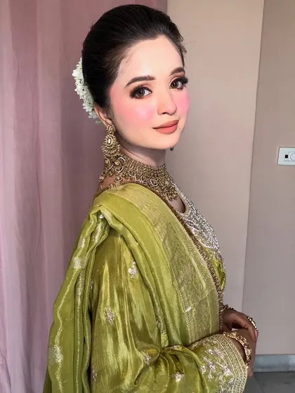 A confident and happy shot of the client, ready for her event.