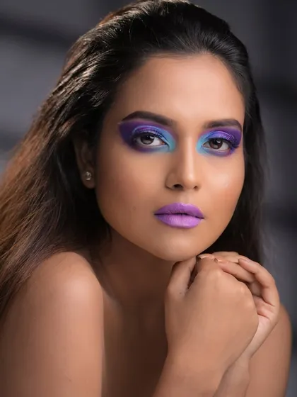 A direct and powerful portrait that showcases the bold color payoff and flawless blending.