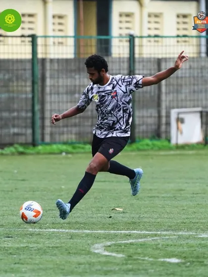 A player executing a powerful strike, a result of countless hours of practice on the training ground.