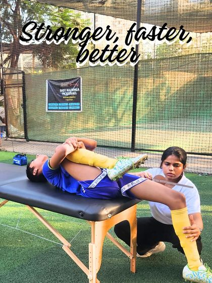 Stronger, faster, better. A physio assists a young athlete with stretching on a therapy table, highlighting our commitment to injury prevention and recovery.