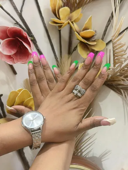 A final look at the bold and modern pink and green French manicure.