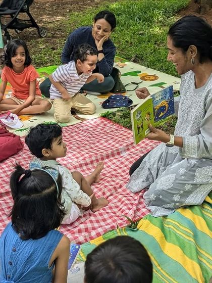 A wonderful collection of photos from our 'Belonging' session, featuring 'Giraffes Can't Dance'. You can see the children's expressive faces as they connect with Gerald the giraffe's journey.
