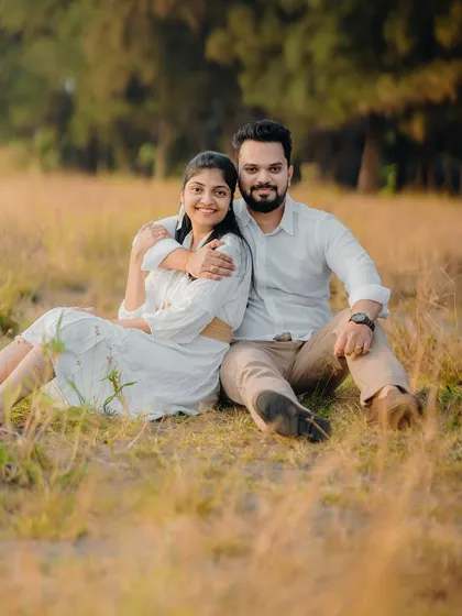 A classic seated portrait in the field. This timeless photo of Milan and Pranali captures their connection in a beautiful, natural setting.