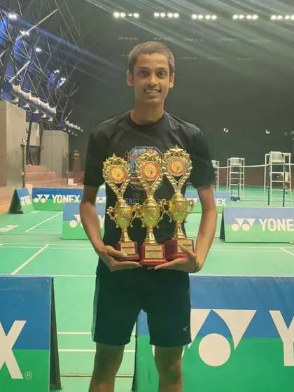 **U-19 Boys' Doubles Bronze Medalist.** Sanrekh Chaurasiya with his three trophies after a strong performance at the U.P. Major U-19 tournament.