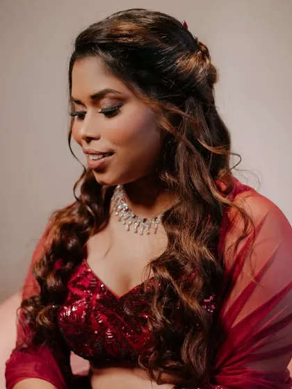 A soft and romantic portrait from the same series. The full look is elegant and modern, perfect for a cocktail or reception event.