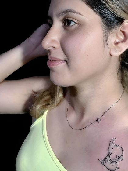 Another angle of the baby elephant tattoo.