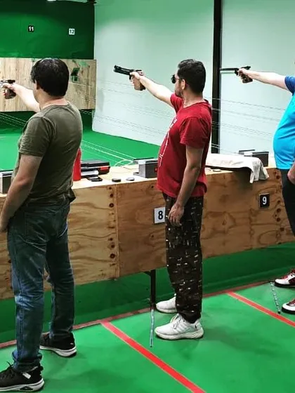 It's not just about rifles. Here are some folks trying out air pistol shooting. It requires a different kind of focus and is a great challenge for anyone looking to try something new.