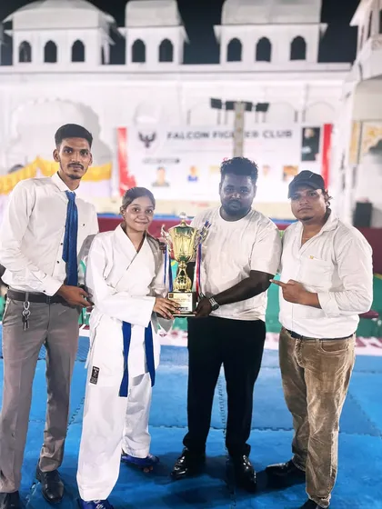 Shifa proudly holding her Grand Championship trophy. Her journey is a great example for all the girls in our dojo, showing them that they can achieve anything.
