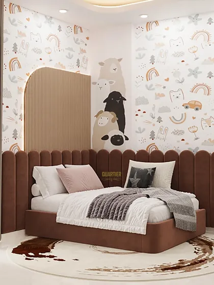 This kids' room design is both fun and functional. The back wall features a playful custom wallpaper, and the bed has a unique L-shaped dual headboard. The room also includes a spacious study area for two.