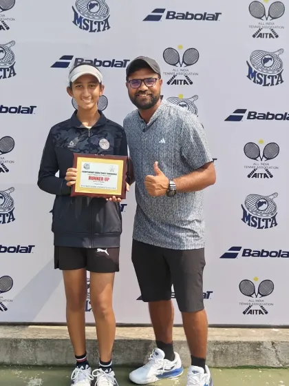 Rumi with me after her U-14 doubles runner-up performance.