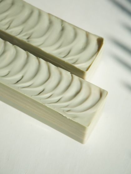 The wavy, textured top of the 'Minty Breeze' soap is inspired by a gentle breeze.