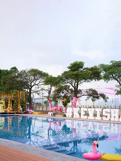 We specialize in creating stunning poolside setups for any celebration. This event features a custom floating hashtag sign, pink flamingo floats, and elegant decor, turning the pool into a chic party centerpiece.