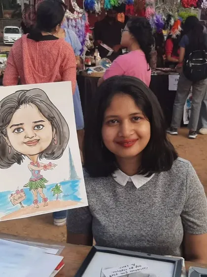 This guest is all smiles with her hula dancer-themed caricature. These events are a great opportunity to get a fun, personalized piece of art.