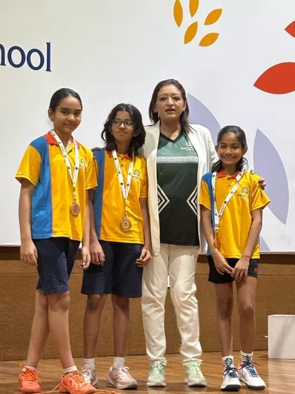 Our U-12 girls team with their coach after securing 3rd place at the Mount Litera International School tournament.