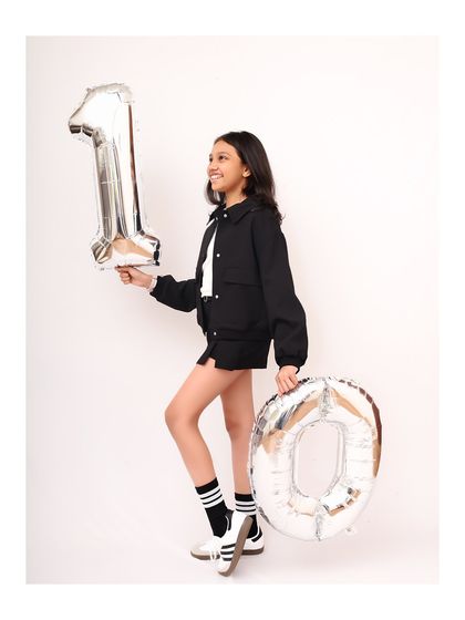 A confident pose for a 10th birthday. These sessions are all about celebrating who they are at this specific age.