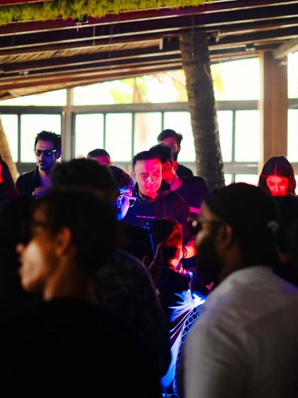Another angle from the dancefloor, showing the mix of red and blue lights that created a dynamic and immersive atmosphere.