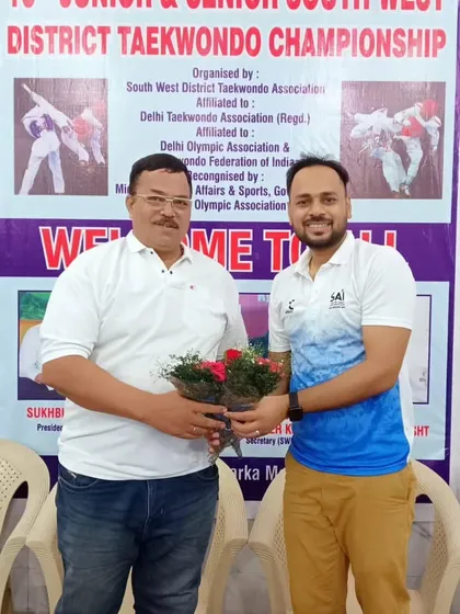 Being felicitated at the district championship. It's an honor to contribute to the development of Taekwondo in the region.