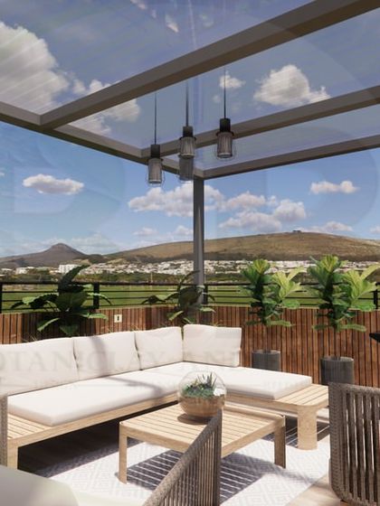 A 3D render of a spacious outdoor lounge on a wooden deck. The design features a large L-shaped sofa and armchairs under a modern pergola, complete with an outdoor grill, making it the ultimate space for hosting guests.
