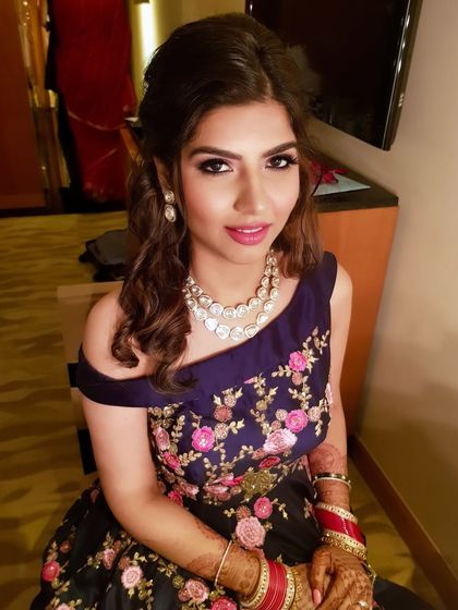 Another angle of this classic glam look, showing the beautifully blended eye makeup and contour.